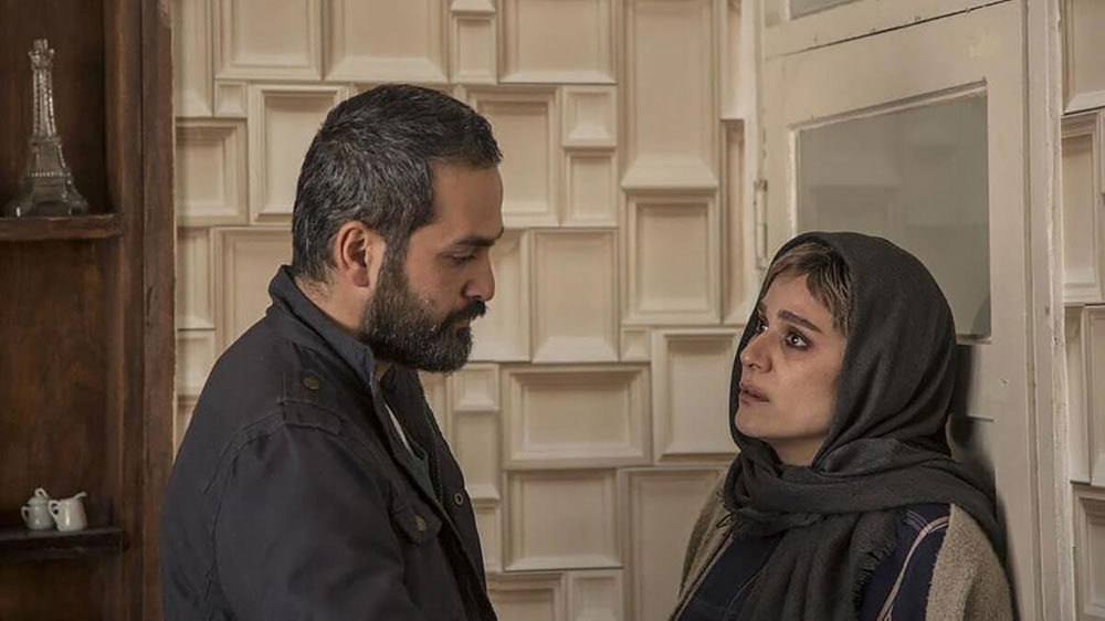 سحر دولتشاهی و میلاد کیمرام در نمایی از فیلم امیر
